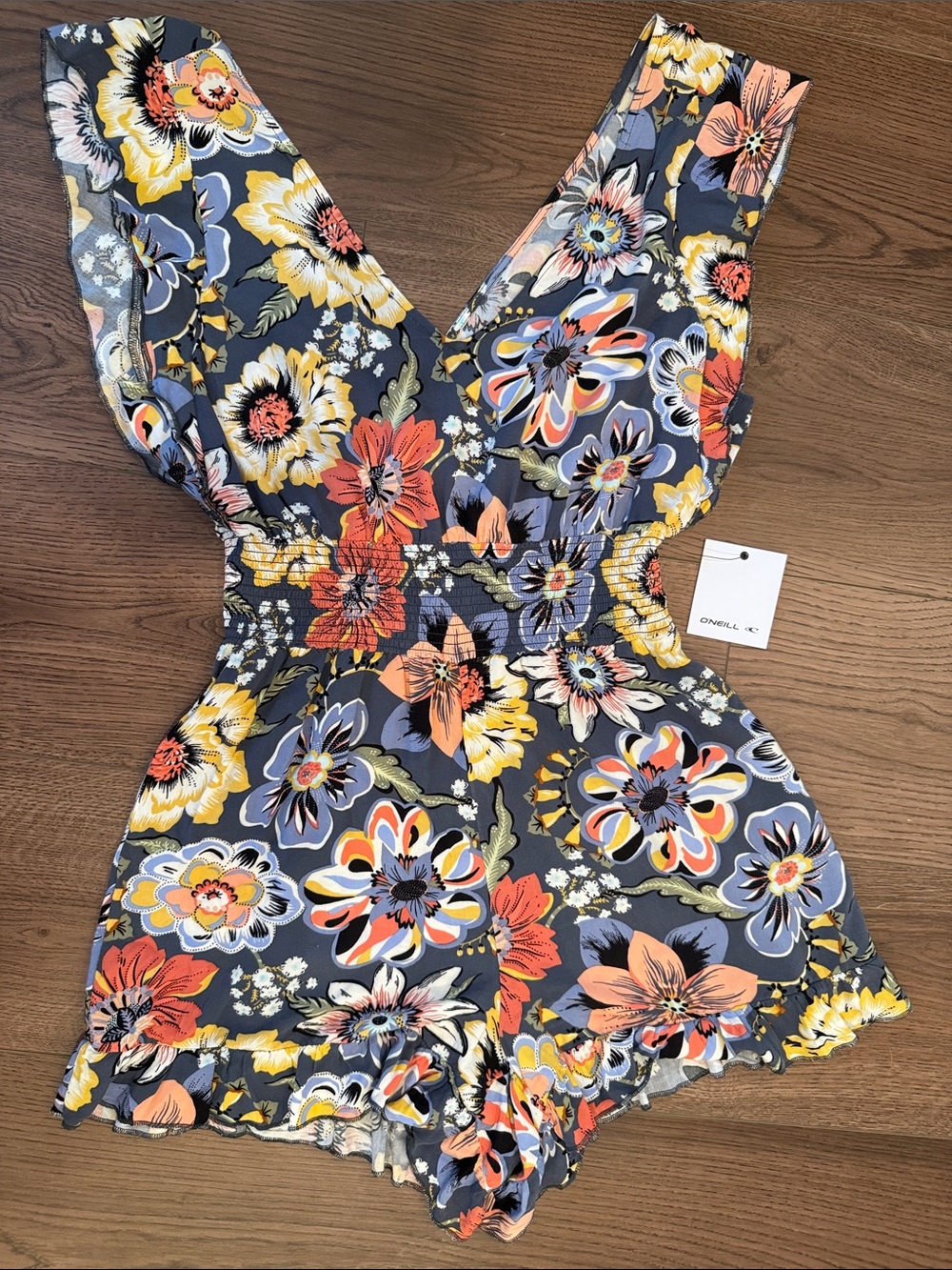 O'Neill Floral Smocked V-Neck Romper
Brand new with tags attached